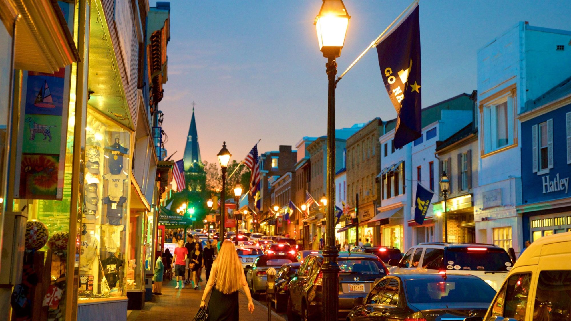 Main Street Annapolis at dusk with Go Navy flags
